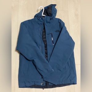 The North Face Men’s Thermoball puffer jacket. Size small in dark blue.